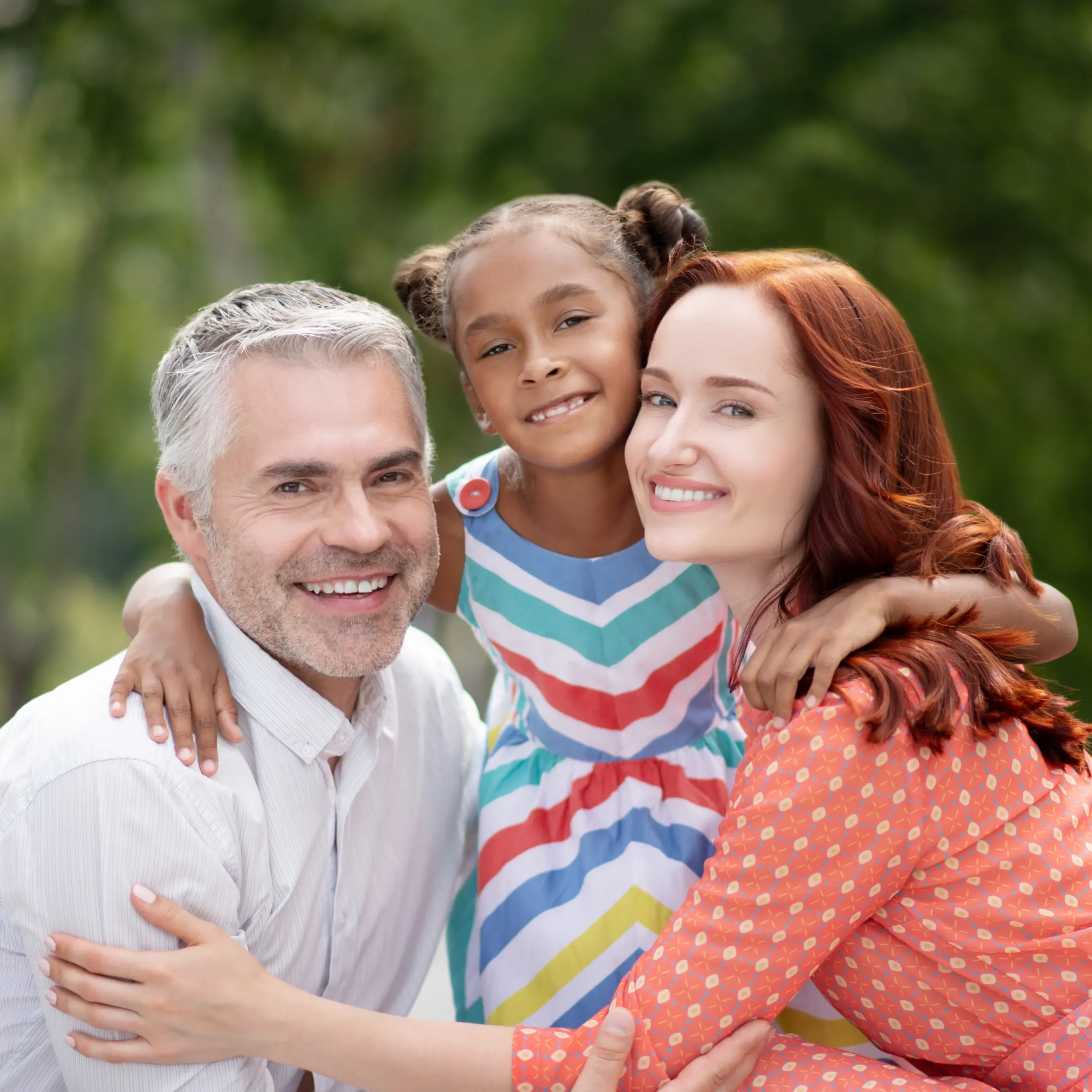 loving-foster-parents-hugging-their-lovely-dark